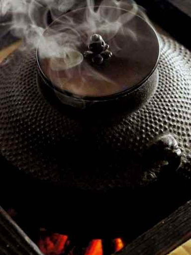 Japanese teapot on fire