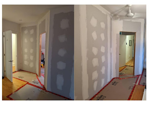 Two views of the new room, with the drywall installed and mudding started.